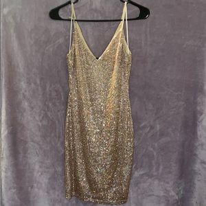 Gold sequin spaghetti strap mini dress.